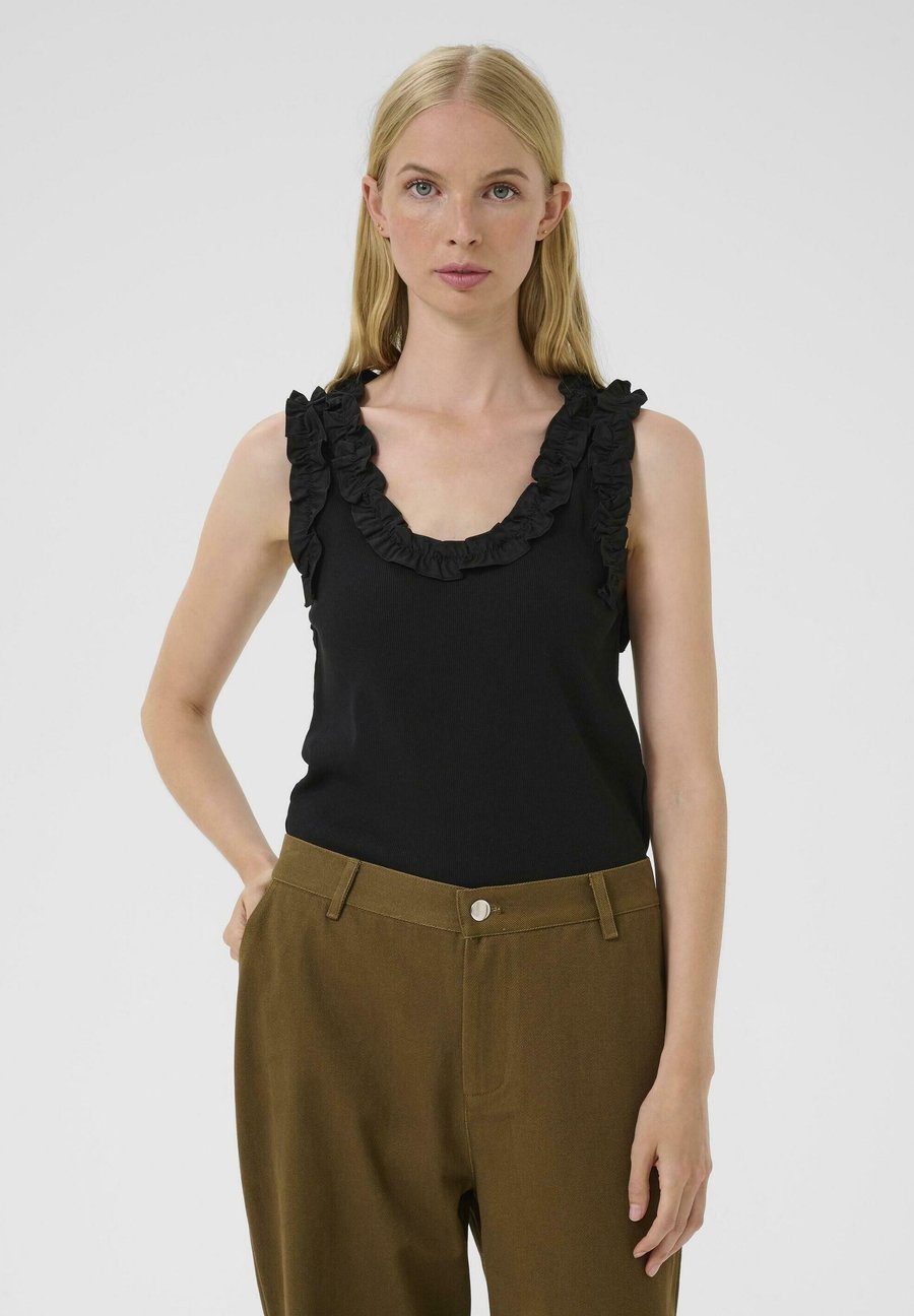 Топ Karen by Simonsen BODA , Meteorite/Black
Топ Karen by Simonsen BODA , Meteorite/Black