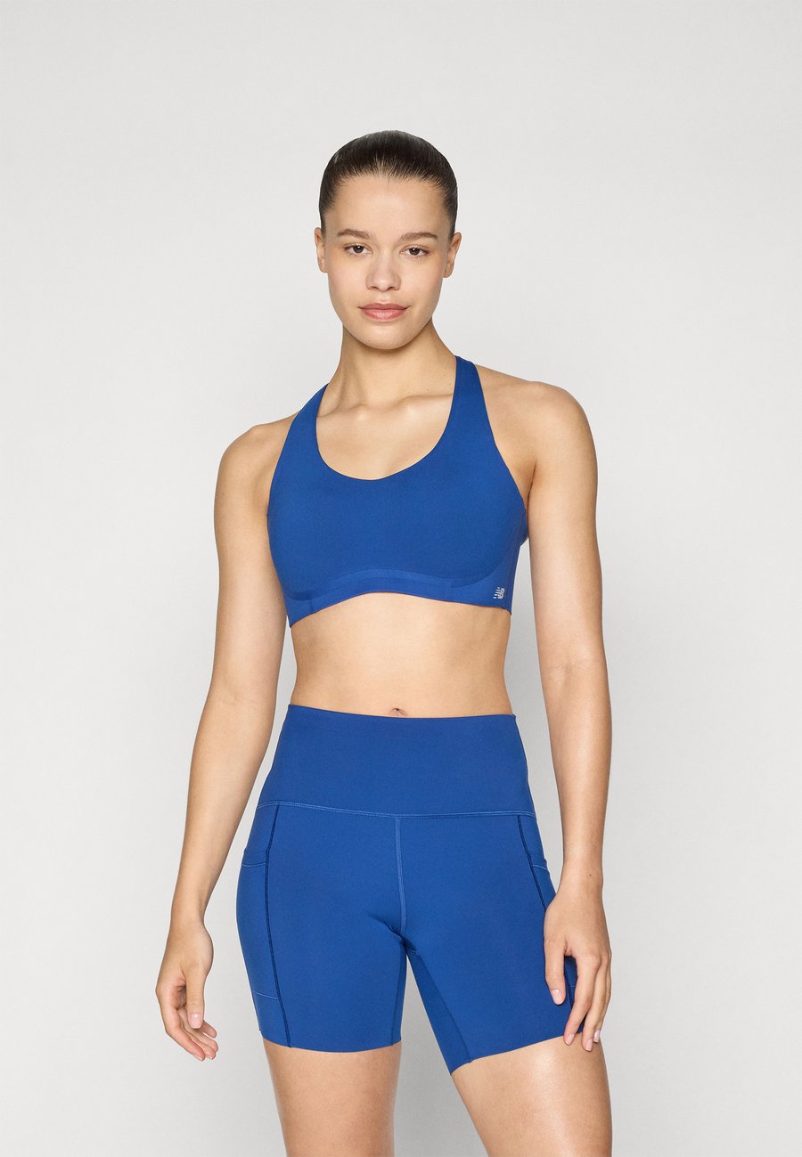 Бюстгальтер New Balance BRA, Galaxy Blue/Dark Blue
Бюстгальтер New Balance BRA, Galaxy Blue/Dark Blue