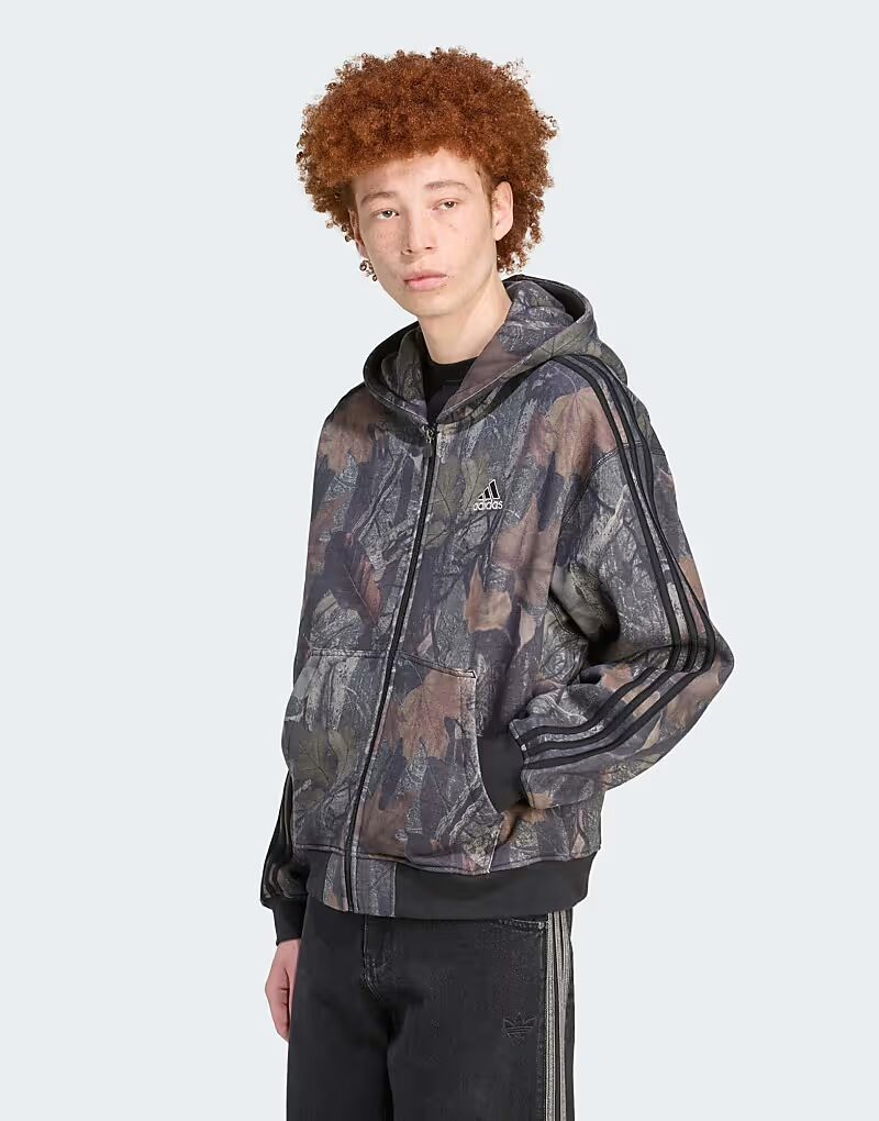 Камуфляжная куртка Camo с капюшоном и молнией черного цвета Adidas Originals
Камуфляжная куртка Camo с капюшоном и молнией черного цвета Adidas Originals