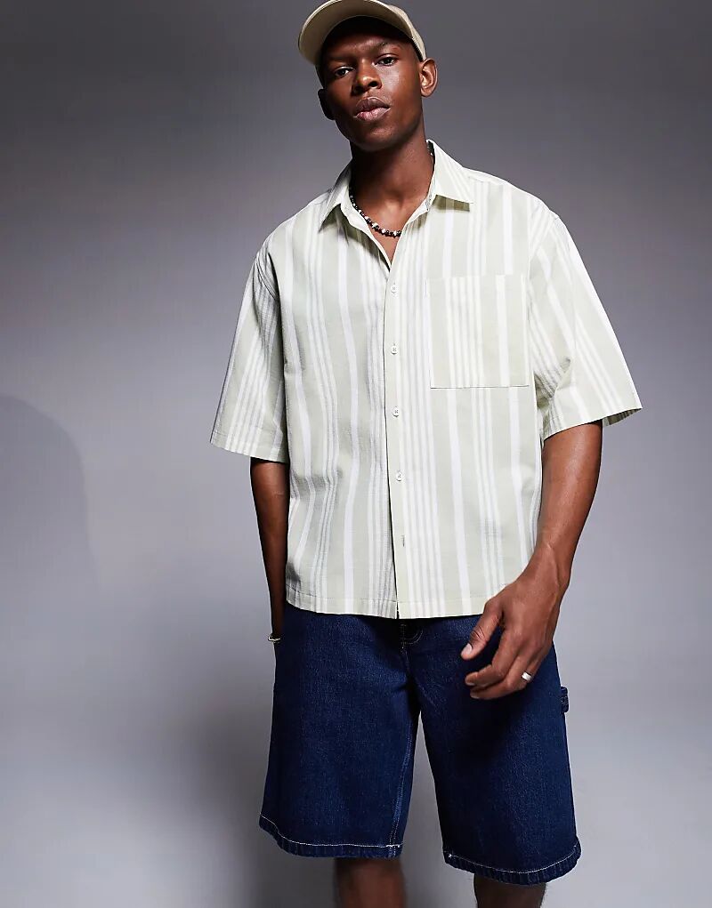 Рубашка свободного кроя ASOS DESIGN в нейтральную полоску
Рубашка свободного кроя ASOS DESIGN в нейтральную полоску