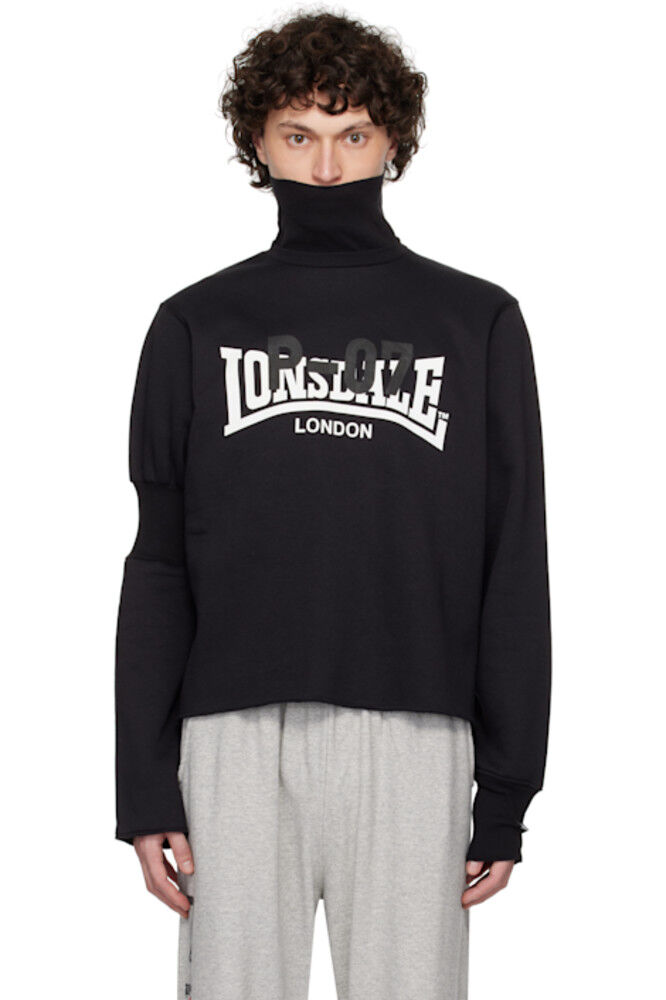 Черная водолазка с нарукавной повязкой Prototypes
Черная водолазка с нарукавной повязкой Prototypes