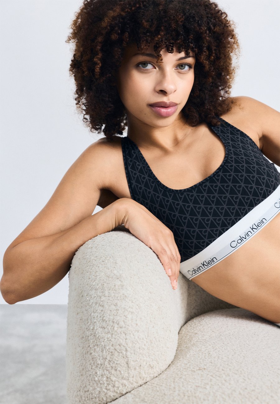 Бюстье Calvin Klein Underwear UNLINED BRALETTE ICON COTTON MODAL, Black/Ashford Gray/Black
Бюстье Calvin Klein Underwear UNLINED BRALETTE ICON COTTON MODAL, Black/Ashford Gray/Black