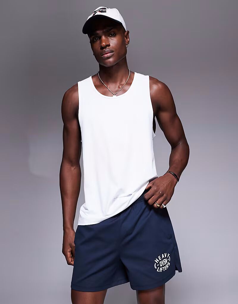 4505 5-дюймовые быстросохнущие сетчатые тренировочные шорты с широкими штанинами и графикой в темно-синем цвете 
4505 5-дюймовые быстросохнущие сетчатые тренировочные шорты с широкими штанинами и графикой в темно-синем цвете