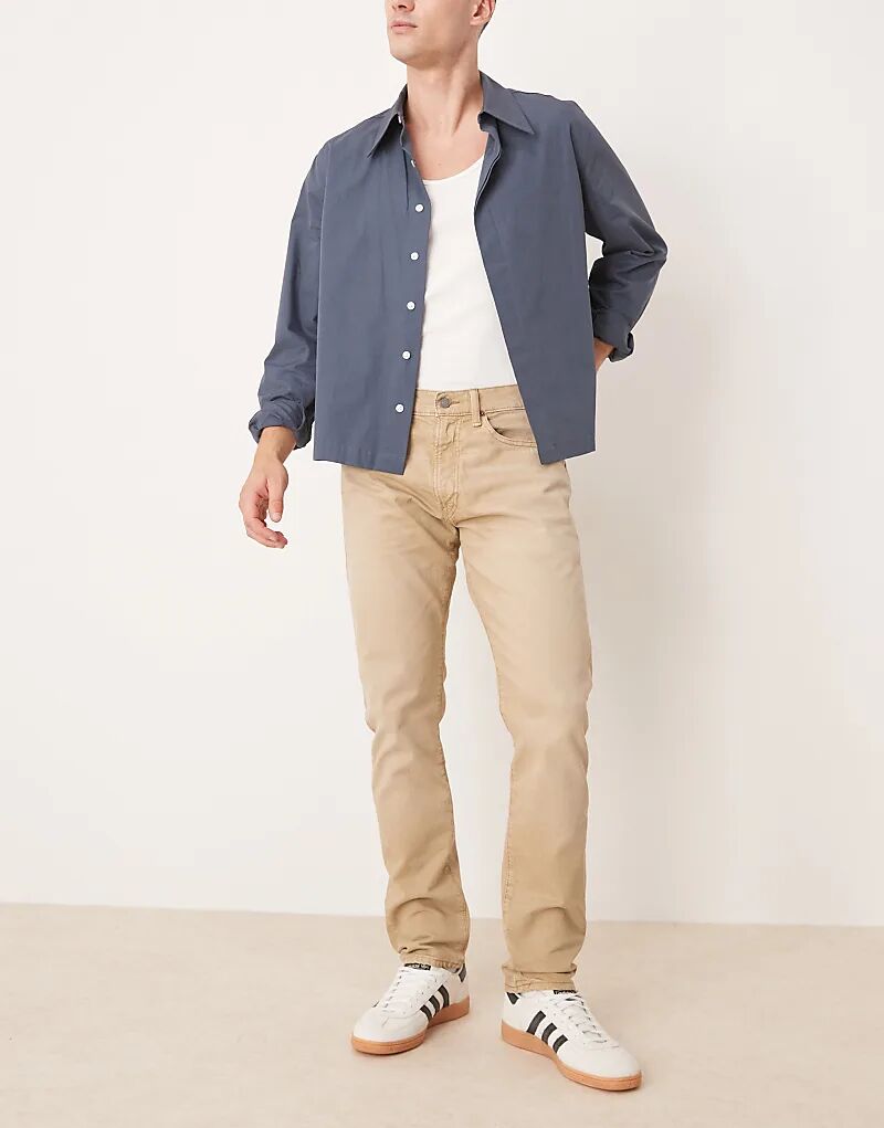 Джинсы Polo Ralph Lauren Sullivan с логотипом и зауженными джинсами цвета хаки и бежевого цвета
Джинсы Polo Ralph Lauren Sullivan с логотипом и зауженными джинсами цвета хаки и бежевого цвета