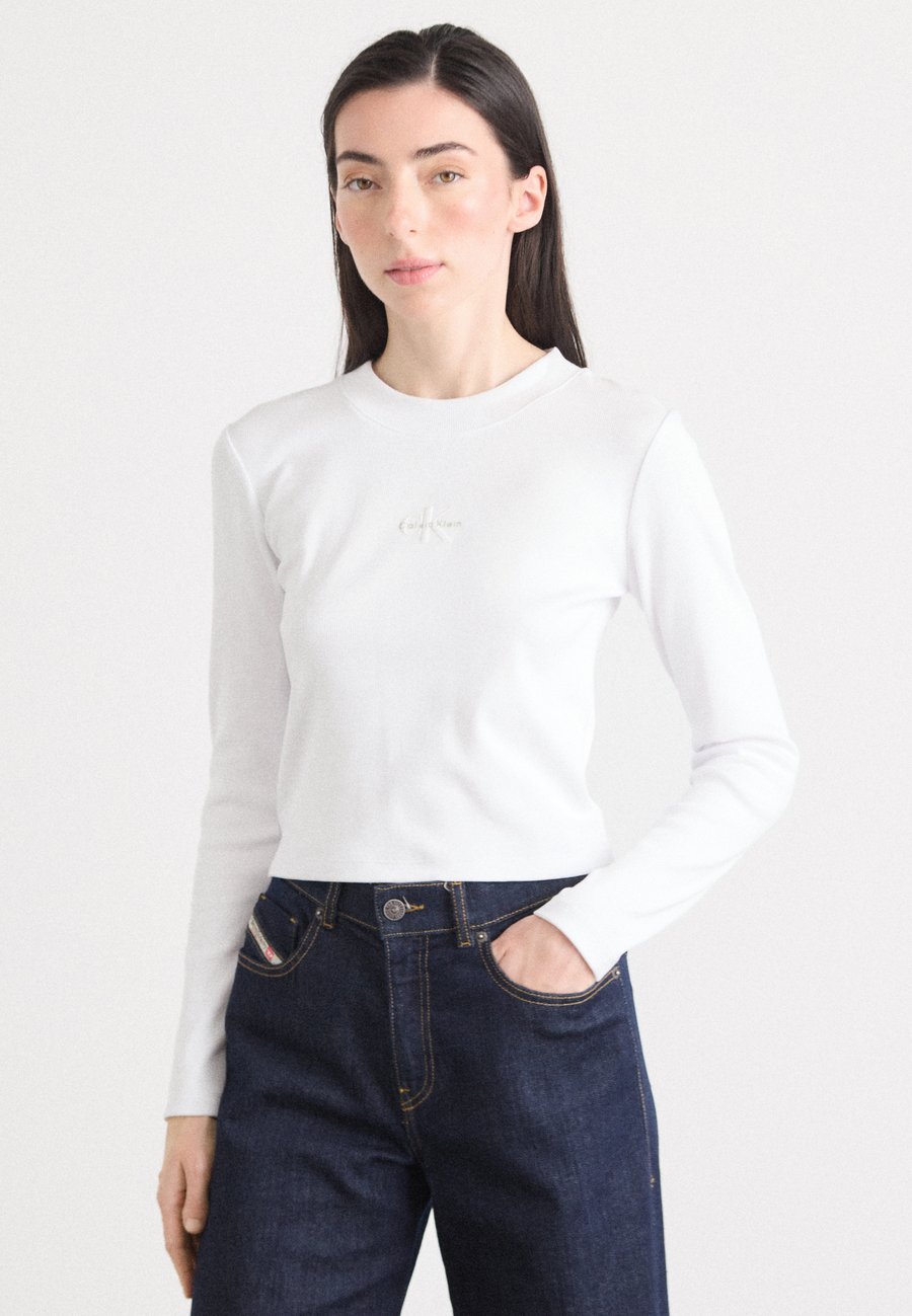 Топ Calvin Klein Jeans MONOGRAM BABY TEE, White
Топ Calvin Klein Jeans MONOGRAM BABY TEE, White