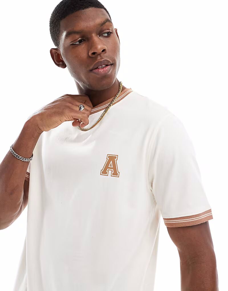 Футболка с графическим принтом Another Influence в кремово-белом цвете
Футболка с графическим принтом Another Influence в кремово-белом цвете