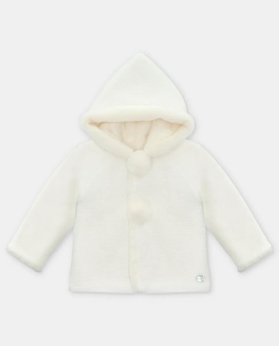 Вязаное детское пальто с капюшоном и меховой подкладкой натурального цвета Martín Aranda
Вязаное детское пальто с капюшоном и меховой подкладкой натурального цвета Martín Aranda