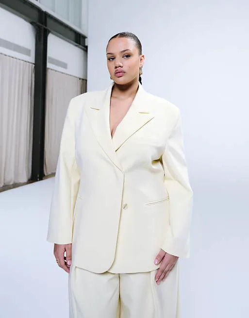 Желтый двубортный пиджак ASOS DESIGN Curve
Желтый двубортный пиджак ASOS DESIGN Curve