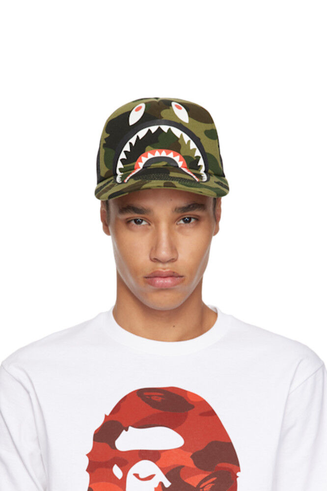 Зеленая и черная кепка 1st Camo Shark Mesh BAPE
Зеленая и черная кепка 1st Camo Shark Mesh BAPE