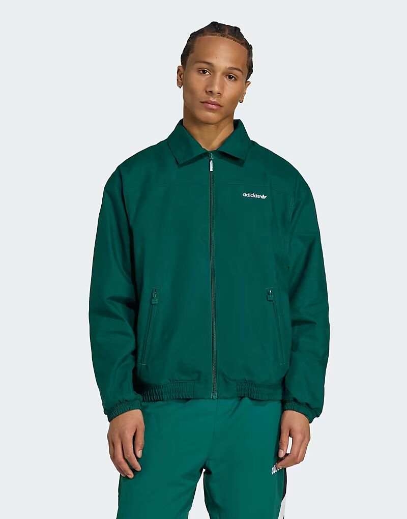 Спортивная майка Adidas Originals Brushed плетеного цвета в студенческом зеленом цвете 
Спортивная майка Adidas Originals Brushed плетеного цвета в студенческом зеленом цвете