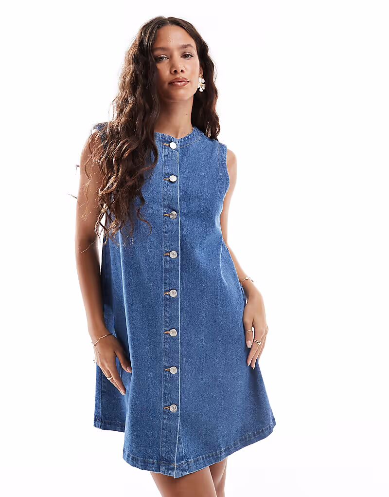 Джинсовое мини-платье-трапеция ASOS DESIGN с застежкой на пуговицы, средне-синего цвета
Джинсовое мини-платье-трапеция ASOS DESIGN с застежкой на пуговицы, средне-синего цвета