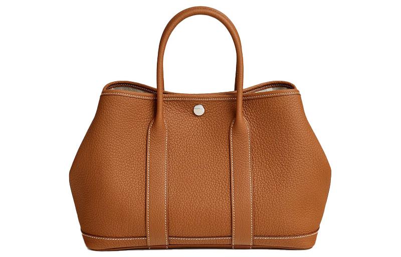 Сумка наплечная Garden Party Negonda из телячьей кожи унисекс 37 Золото Золотисто-коричневый HERMES
Сумка наплечная Garden Party Negonda из телячьей кожи унисекс 37 Золото Золотисто-коричневый HERMES