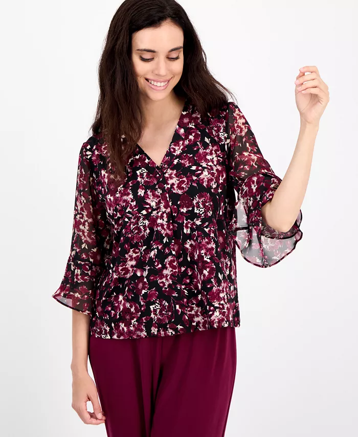 Миниатюрная блузка с цветочным принтом и рукавами-колокольчиками AK Anne Klein, черный
Миниатюрная блузка с цветочным принтом и рукавами-колокольчиками AK Anne Klein, черный