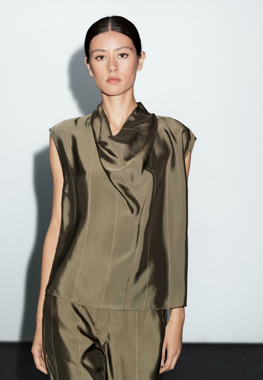 Блуза Massimo Dutti FLOWING GARMENT WITH STRIPED DETAILS, Khaki
Блуза Massimo Dutti FLOWING GARMENT WITH STRIPED DETAILS, Khaki