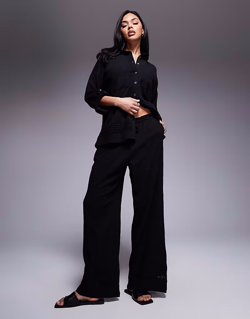 Широкие брюки River Island с жатым кроем, черного цвета
Широкие брюки River Island с жатым кроем, черного цвета