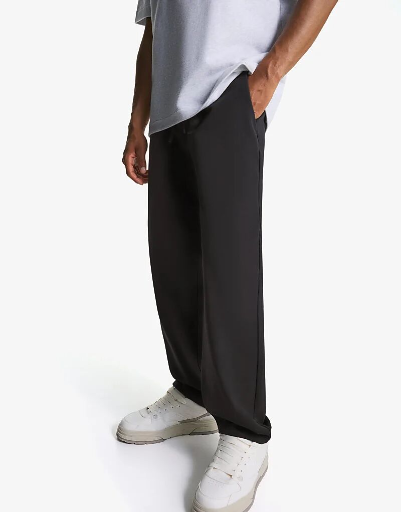 Спортивные брюки Bershka прямого кроя черного цвета
Спортивные брюки Bershka прямого кроя черного цвета