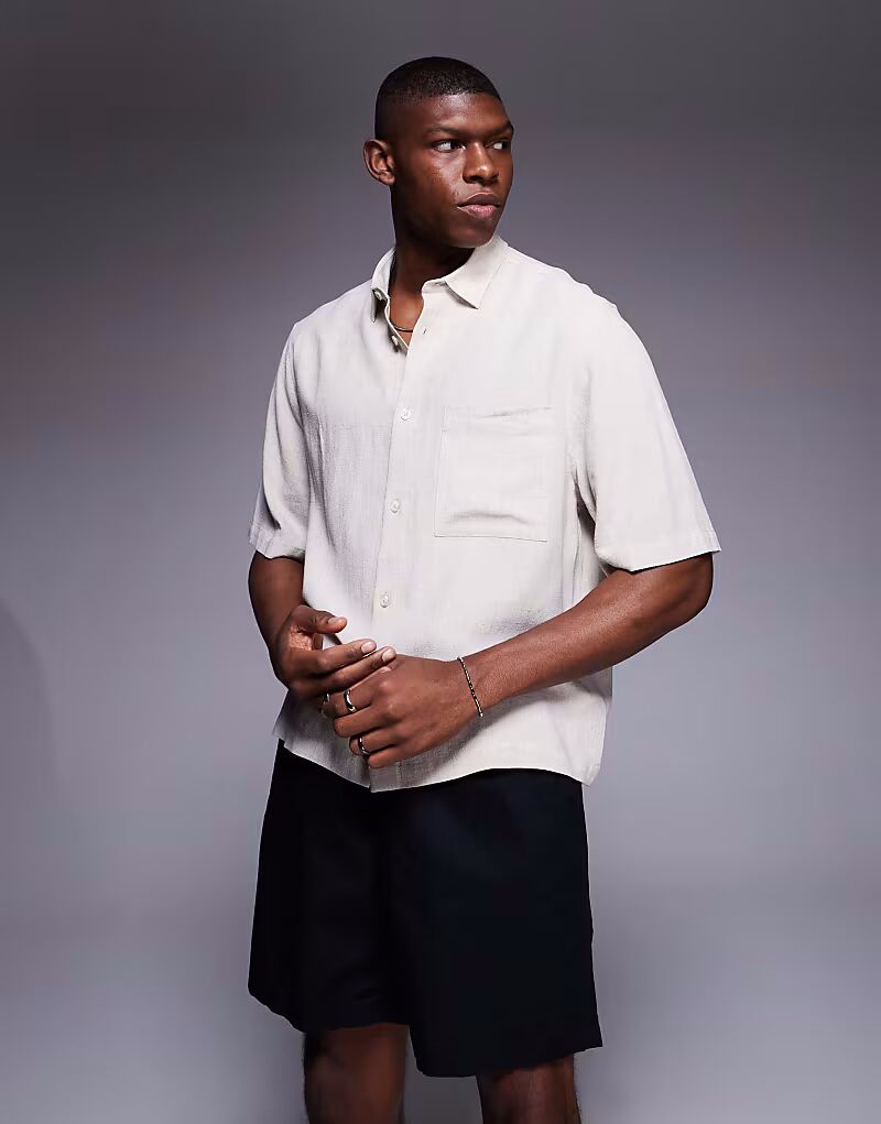 Рубашка свободного кроя из льняной смеси ASOS DESIGN цвета «камень»
Рубашка свободного кроя из льняной смеси ASOS DESIGN цвета «камень»