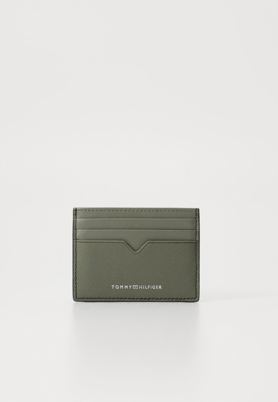 Кошелек Tommy Hilfiger EDGE HOLDER, Battle Green/Dark Green
Кошелек Tommy Hilfiger EDGE HOLDER, Battle Green/Dark Green