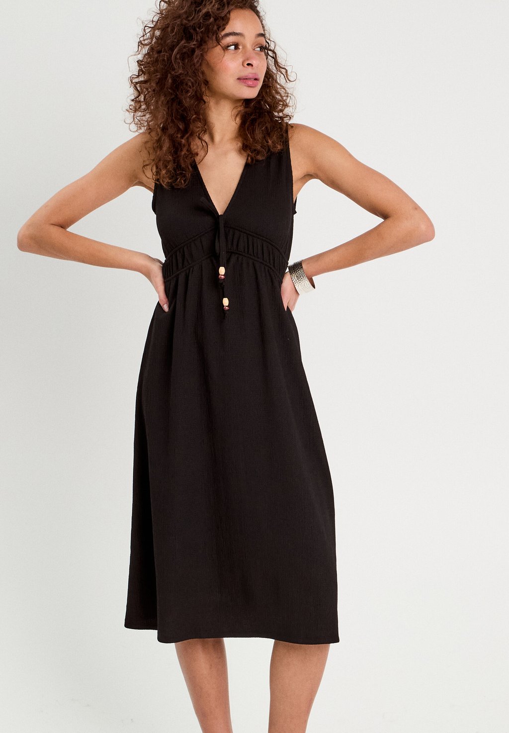 Повседневное платье ÄRMELLOSES Cache Cache, черный
Повседневное платье ÄRMELLOSES Cache Cache, черный