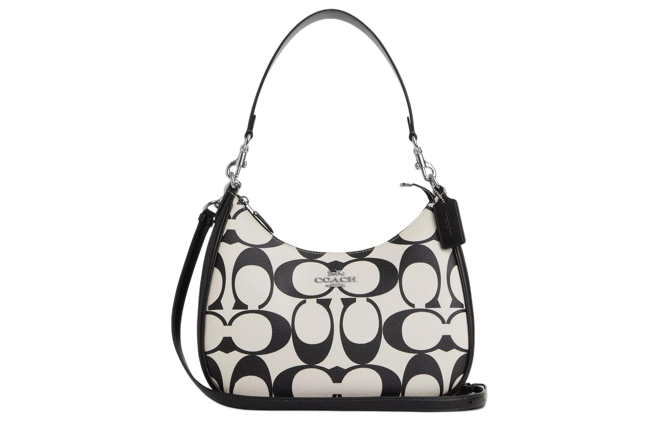 COACH Тканевая сумка через плечо с кожаными вставками
COACH Тканевая сумка через плечо с кожаными вставками