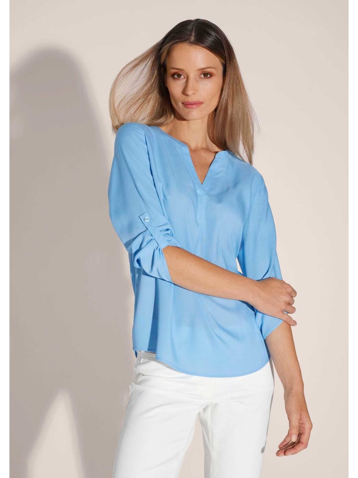 MADELEINE Блузка без застежек с манжетами на рукавах небесно-голубого цвета
MADELEINE Блузка без застежек с манжетами на рукавах небесно-голубого цвета