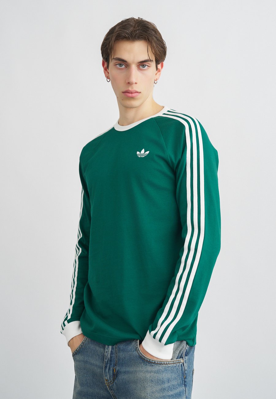 Топ Adidas Originals STRIPES TEE, Collegiate Green/Dark Green
Топ Adidas Originals STRIPES TEE, Collegiate Green/Dark Green