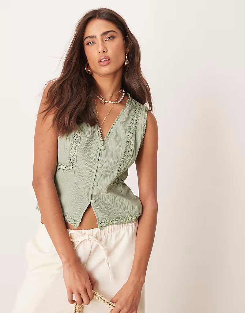 Жилет с кружевной отделкой цвета шалфея Asos Design
Жилет с кружевной отделкой цвета шалфея Asos Design