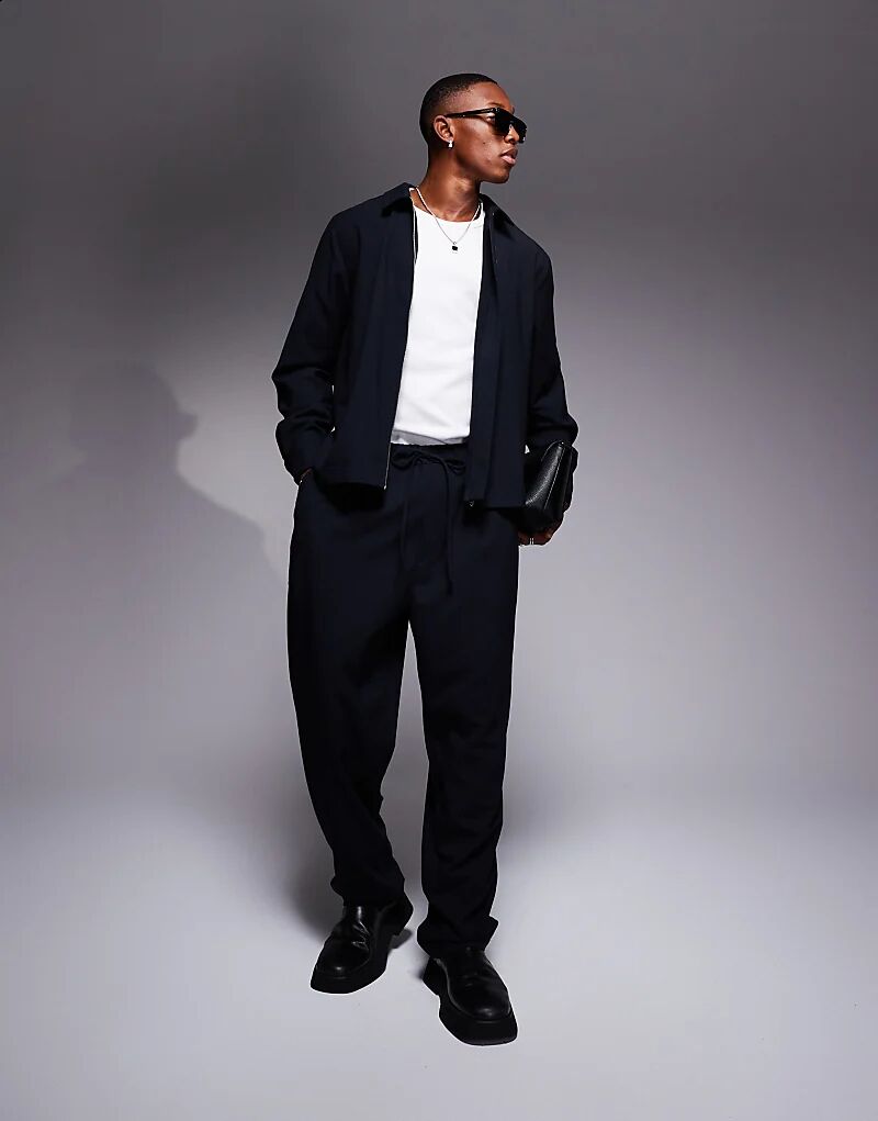 Брюки свободного кроя ASOS DESIGN темно-синего цвета (часть комплекта)
Брюки свободного кроя ASOS DESIGN темно-синего цвета (часть комплекта)