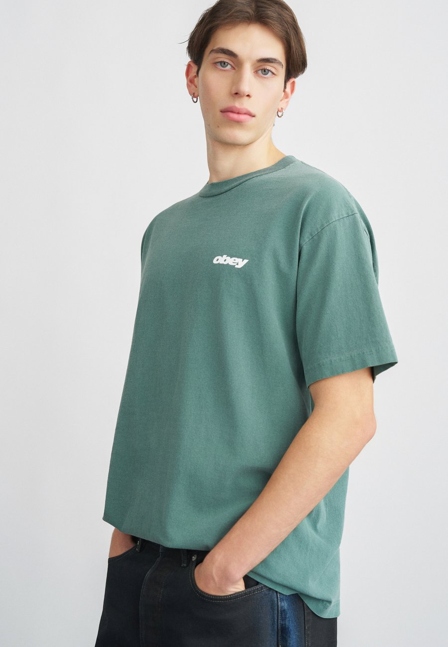 Футболка Obey Clothing BOUNCE, Pigment Rainforest/Green, Зеленый, Футболка Obey Clothing BOUNCE, Pigment Rainforest/Green
Футболка Obey Clothing BOUNCE, Pigment Rainforest/Green, Зеленый, Футболка Obey Clothing BOUNCE, Pigment Rainforest/Green