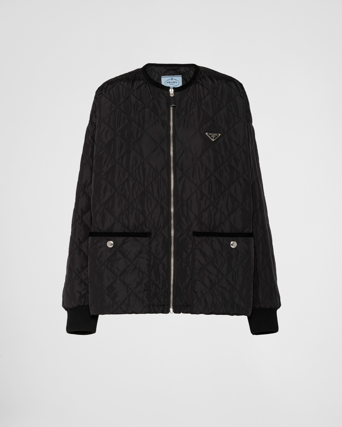 Стеганая легкая куртка из Re-Nylon Prada, черный
Стеганая легкая куртка из Re-Nylon Prada, черный