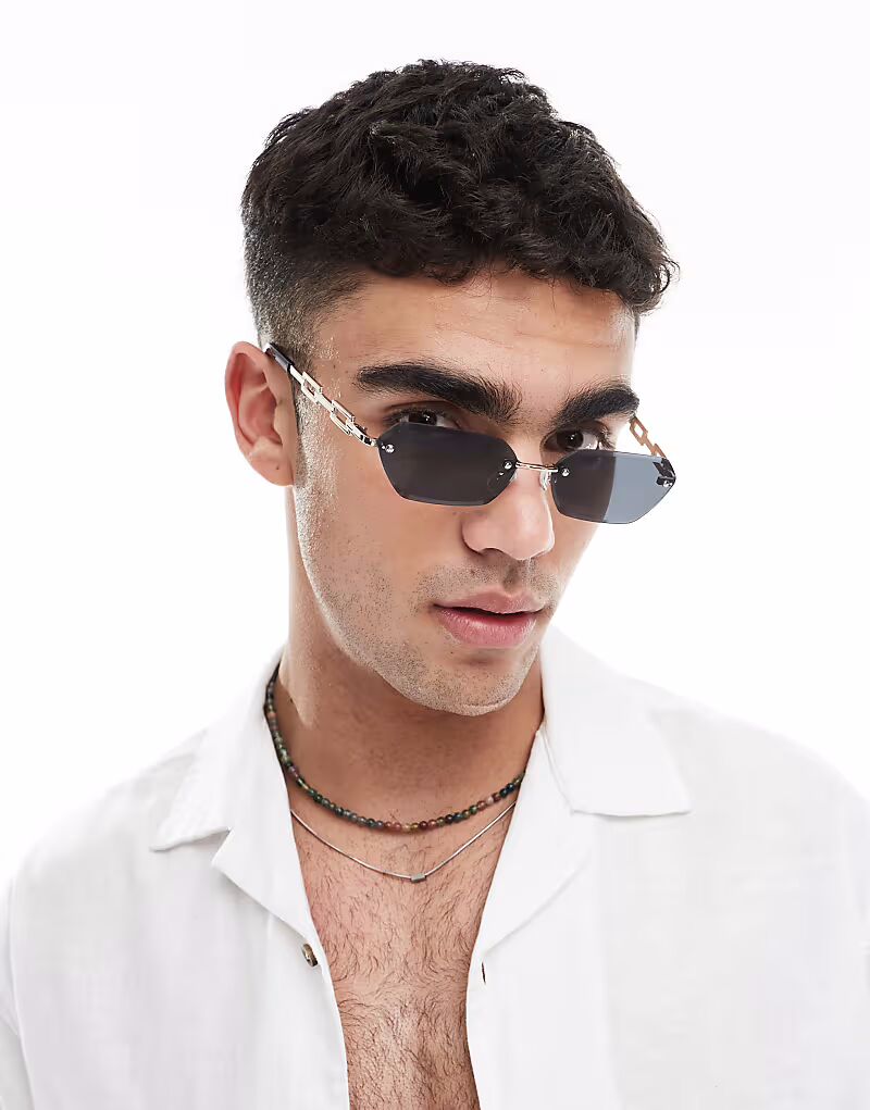 Солнцезащитные очки без оправы с дымчатыми прямоугольными линзами и металлической золотой оправой Asos Design
Солнцезащитные очки без оправы с дымчатыми прямоугольными линзами и металлической золотой оправой Asos Design