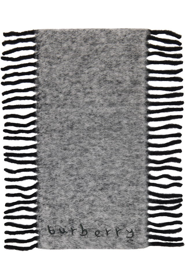 Burberry Серый шарф из смеси шерсти альпаки
Burberry Серый шарф из смеси шерсти альпаки