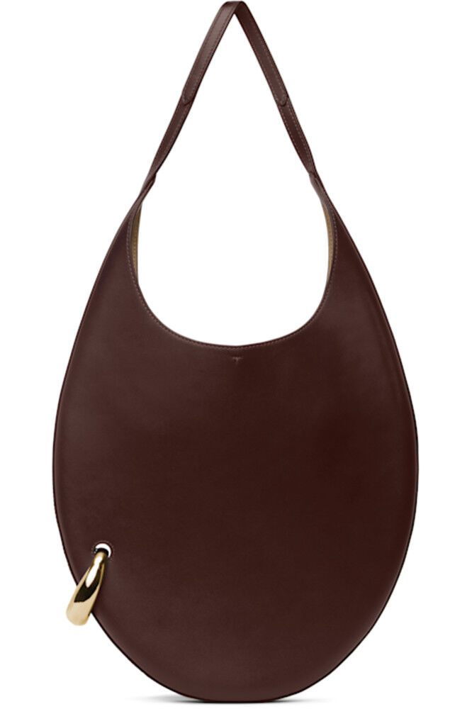 Сумка бордового цвета с пирсингом Tory Burch
Сумка бордового цвета с пирсингом Tory Burch