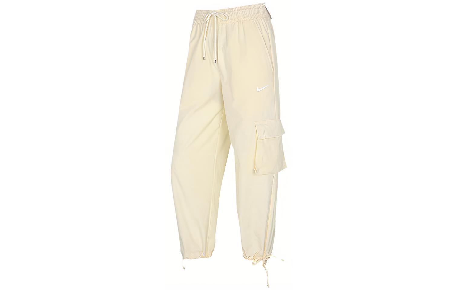 Вязаные спортивные брюки женские бежево-желтые Nike
Вязаные спортивные брюки женские бежево-желтые Nike