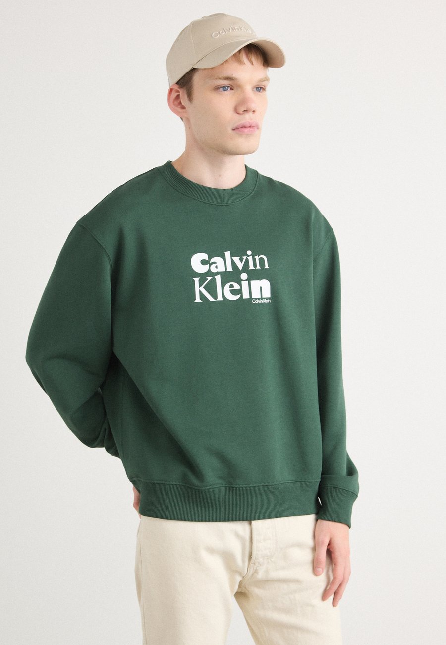 Толстовка Calvin Klein Sweatshirt, Sycamore/Olive
Толстовка Calvin Klein Sweatshirt, Sycamore/Olive