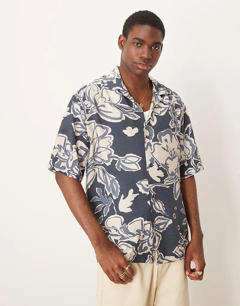 Рубашка Mango с короткими рукавами и абстрактным цветочным принтом
Рубашка Mango с короткими рукавами и абстрактным цветочным принтом