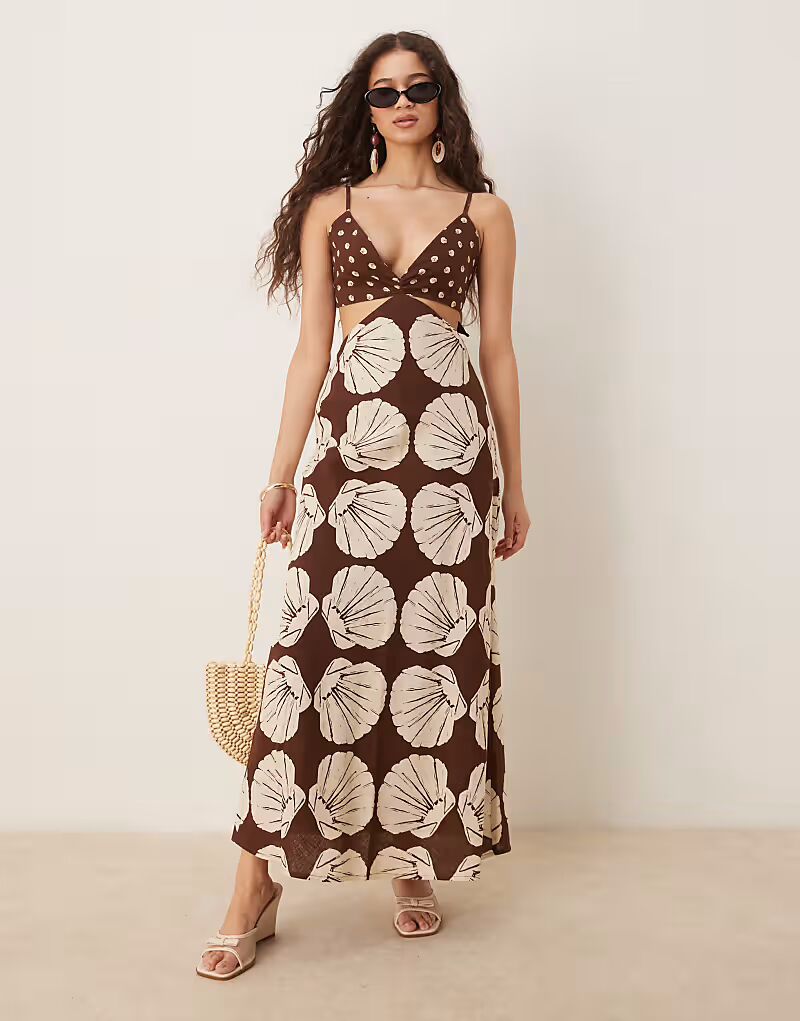 Длинное льняное платье-комбинация с вырезами и тонкими бретельками от Abercrombie & Fitch в коричневом принте 
Длинное льняное платье-комбинация с вырезами и тонкими бретельками от Abercrombie & Fitch в коричневом принте