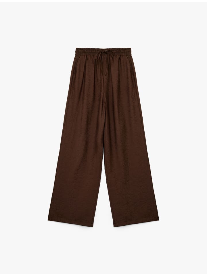 Брюки коричневого цвета KOTON
Брюки коричневого цвета KOTON