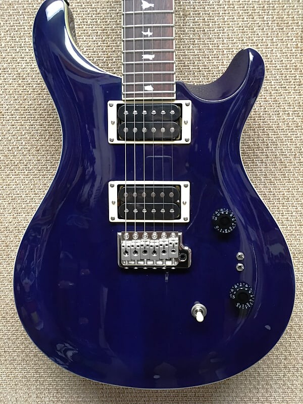 Электрогитара PRS SE Standard 24-08 Solidbody Electric Guitar Translucent Blue Mahogany/Maple, Gig Bag
Электрогитара PRS SE Standard 24-08 Solidbody Electric Guitar Translucent Blue Mahogany/Maple, Gig Bag