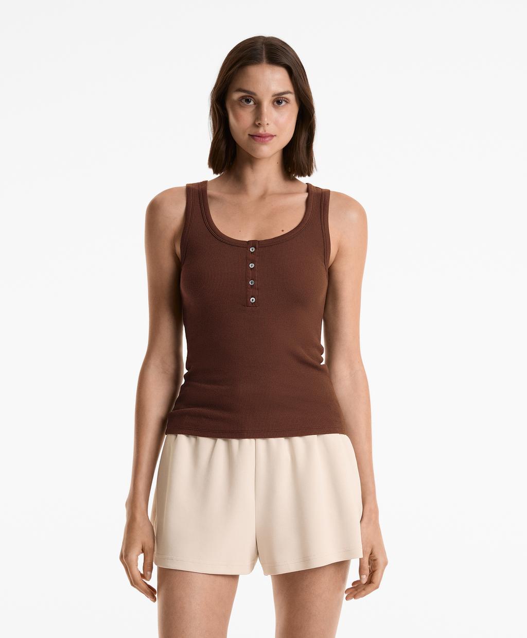 Топ без рукавов на пуговицах из хлопка и модала Oysho, коричневый
Топ без рукавов на пуговицах из хлопка и модала Oysho, коричневый