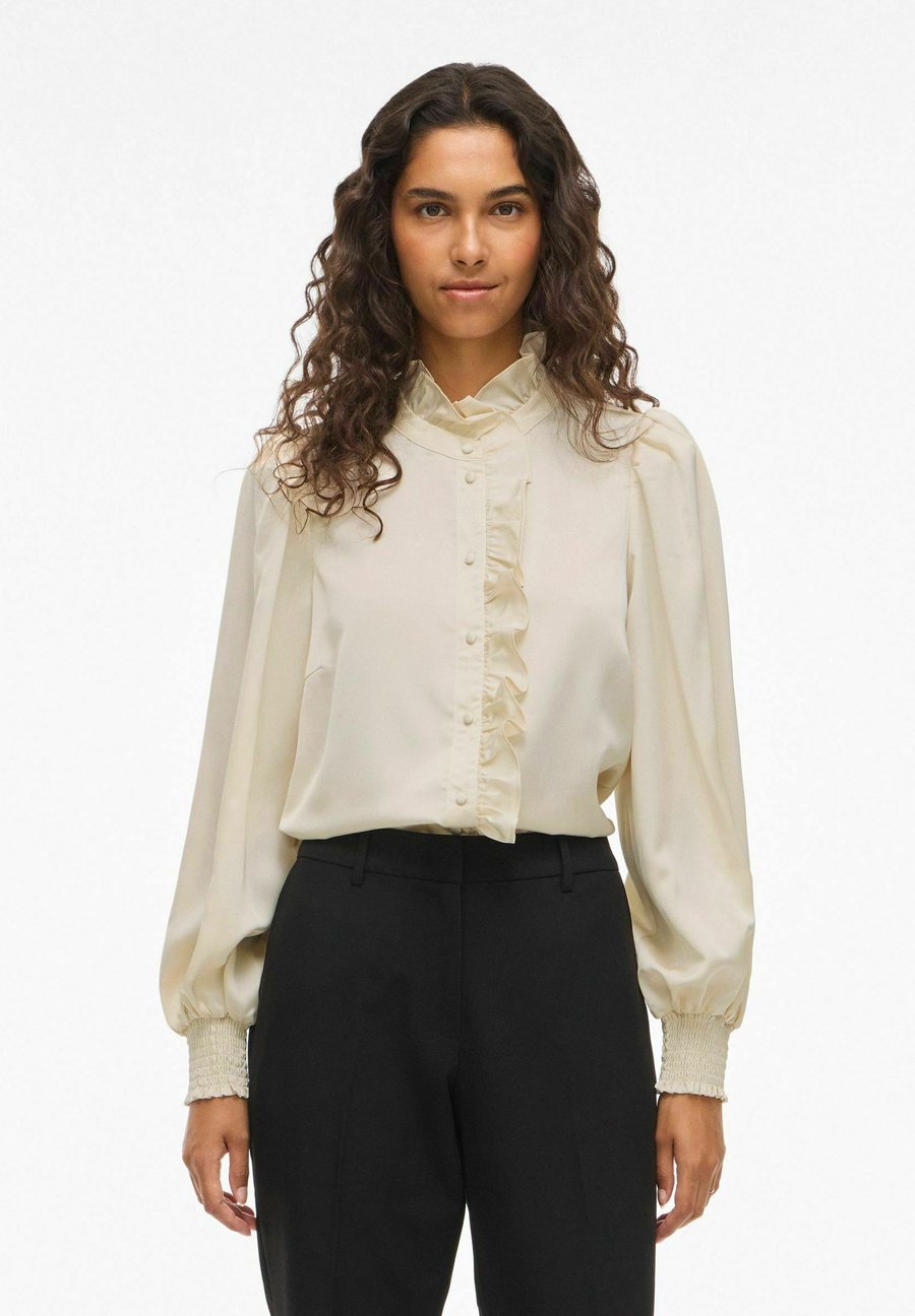 Блуза VILA VILUTTO FRILL, Birch/White
Блуза VILA VILUTTO FRILL, Birch/White