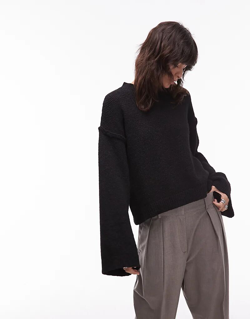 Вязаный джемпер ASOS DESIGN с открытыми швами из шерсти черного цвета
Вязаный джемпер ASOS DESIGN с открытыми швами из шерсти черного цвета