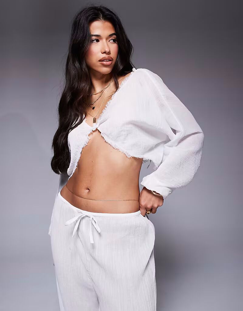 Пляжный топ из хлопка ASOS DESIGN Mira с завязками спереди белого цвета
Пляжный топ из хлопка ASOS DESIGN Mira с завязками спереди белого цвета