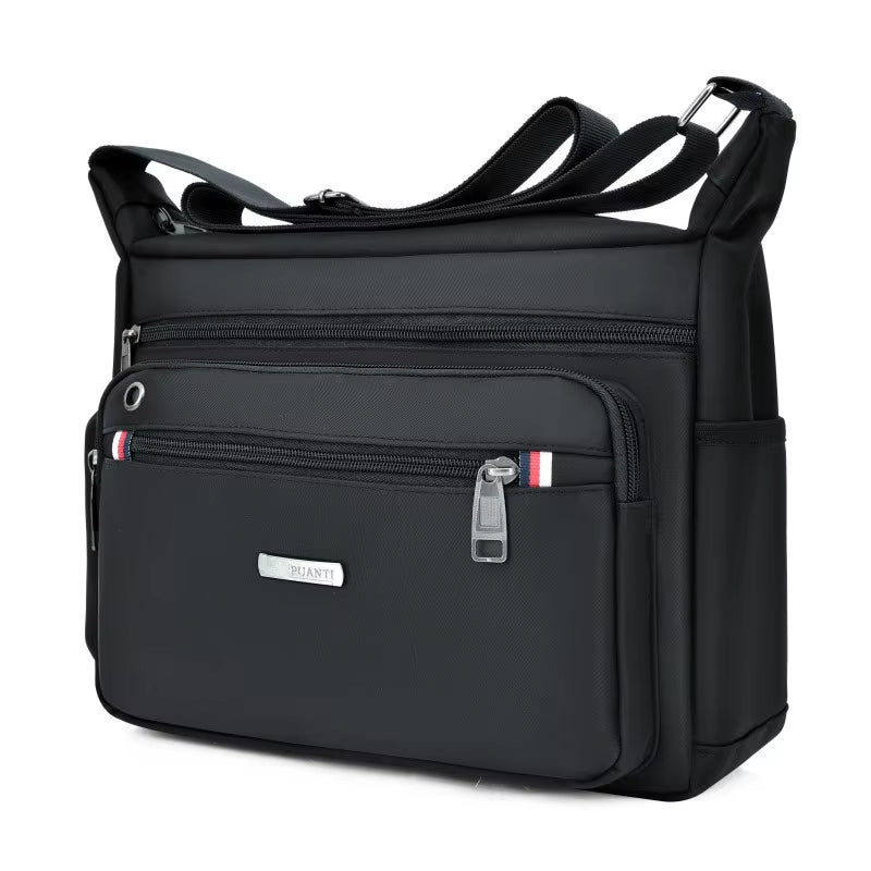 Вместительная повседневная сумка через плечо из ткани Оксфорд - универсальная легкая сумка на плечо для путешествий PUANTI, черный
Вместительная повседневная сумка через плечо из ткани Оксфорд - универсальная легкая сумка на плечо для путешествий PUANTI, черный