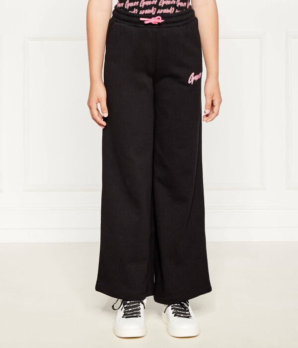 Спортивные штаны для девочек Guess широкого кроя на кулиске, черный
Спортивные штаны для девочек Guess широкого кроя на кулиске, черный