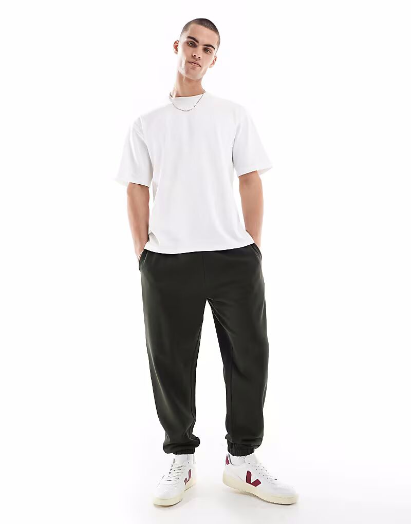 Брюки-джоггеры ASOS DESIGN Essential зауженного кроя темно-зеленого цвета
Брюки-джоггеры ASOS DESIGN Essential зауженного кроя темно-зеленого цвета