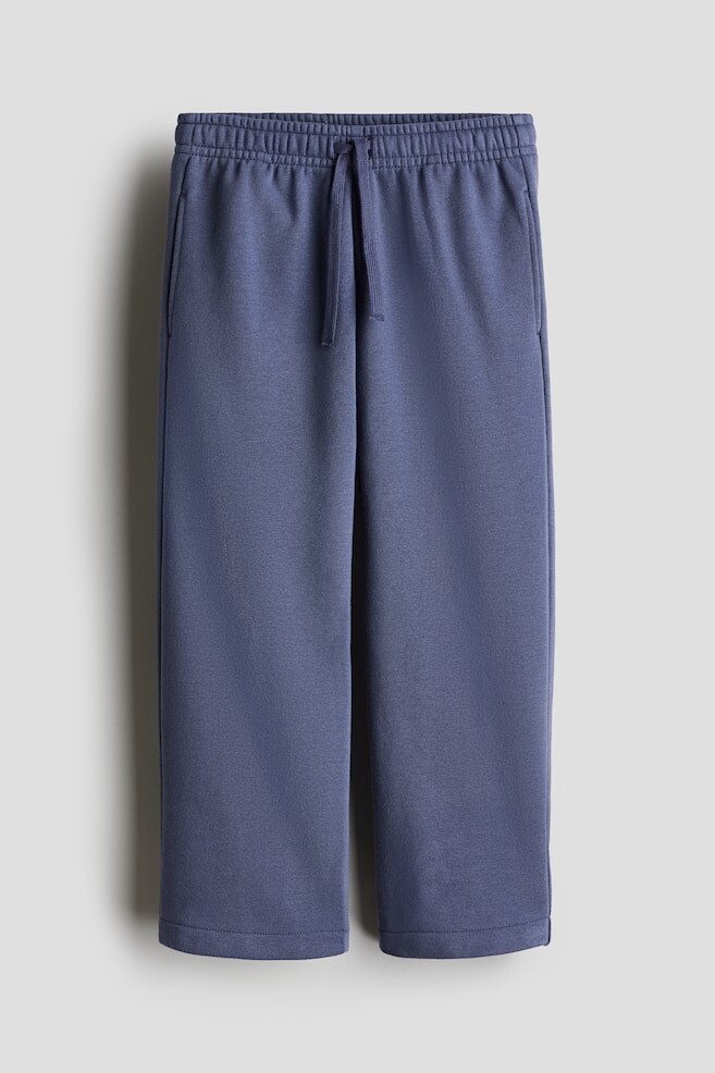 Прямые спортивные штаны из трикотажной ткани. H&M, синий 
Прямые спортивные штаны из трикотажной ткани. H&M, синий