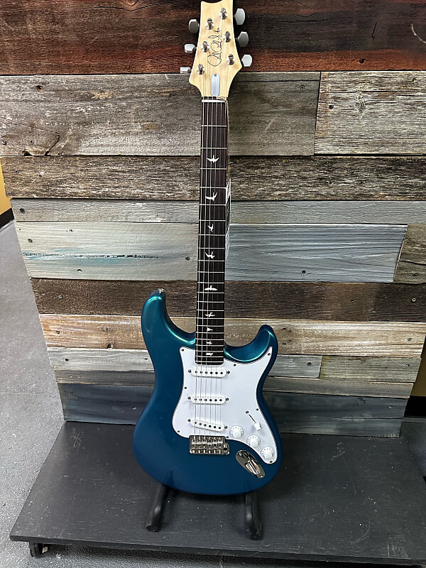 Электрогитара PRS Silver Sky John Mayer Signature with Rosewood Fretboard 2019 - Present - Dodgem Blue
Электрогитара PRS Silver Sky John Mayer Signature with Rosewood Fretboard 2019 - Present - Dodgem Blue