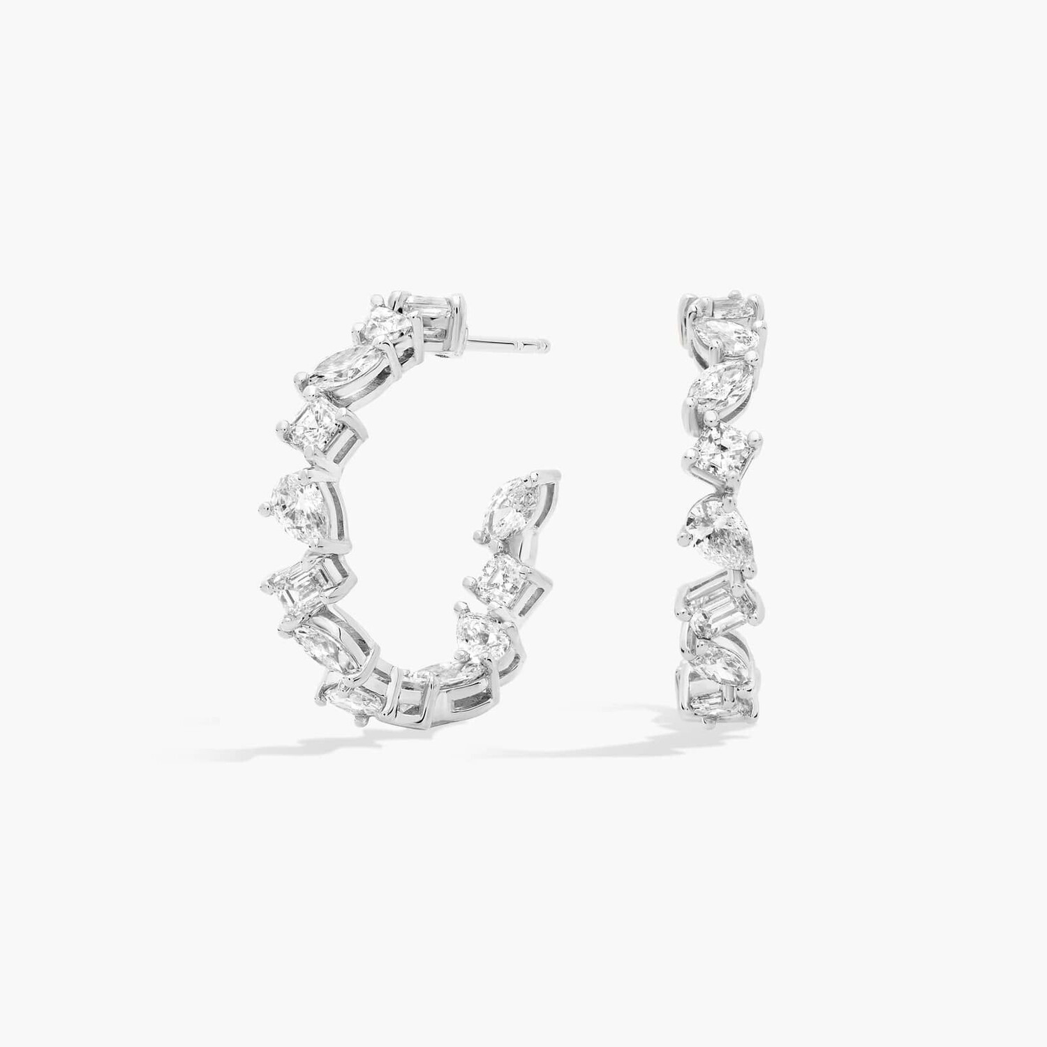 Серьги-кольца с бриллиантами разной формы из 14-каратного белого золота (2 карата) Blue Nile
Серьги-кольца с бриллиантами разной формы из 14-каратного белого золота (2 карата) Blue Nile