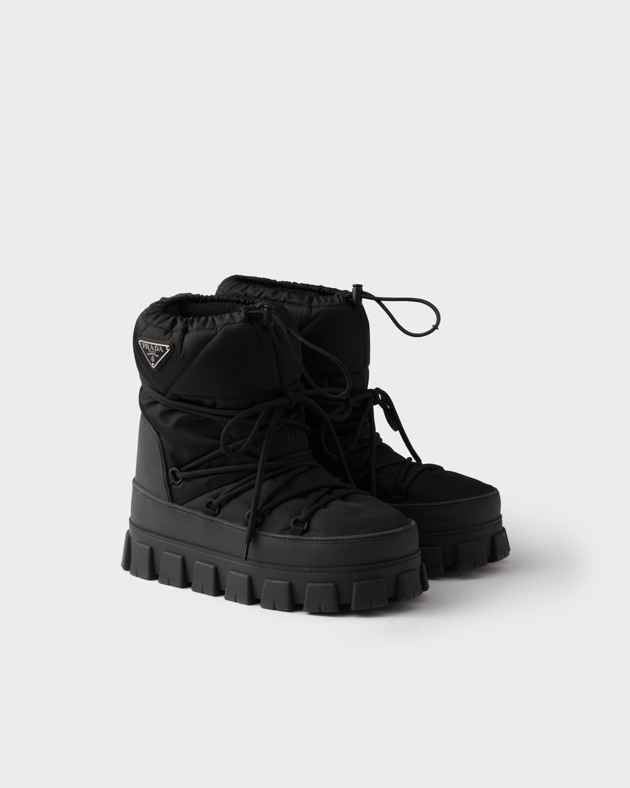 Ботильоны après-ski из габардина Re-Nylon Prada, черный
Ботильоны après-ski из габардина Re-Nylon Prada, черный